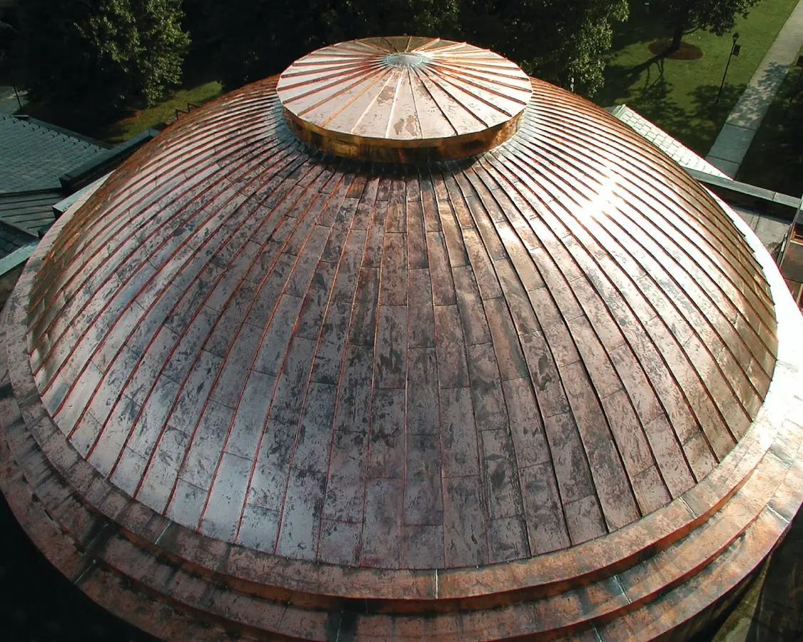 Craftsman Roofing crew installing a new roof in Tecumseh